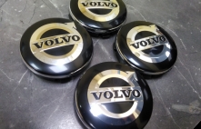 Volvo Колпачки для дисков 64mm 